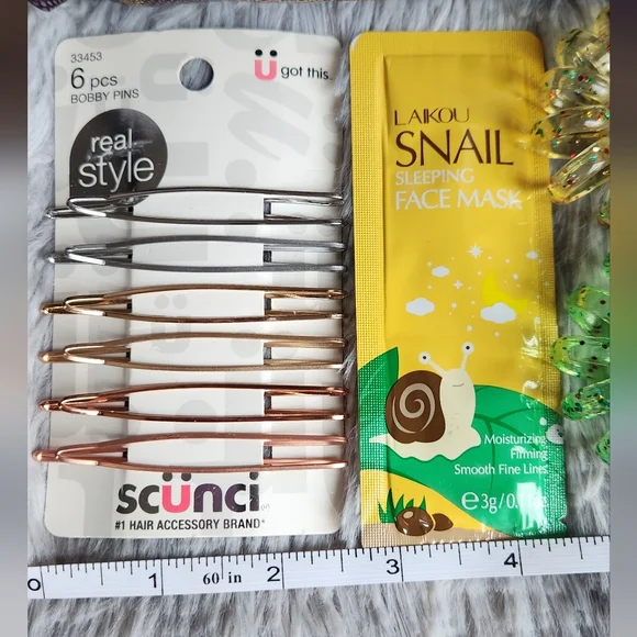 Checkered Cosmetic Pouch with Hair Accessories & Snail Mask - Picture 4 of 6